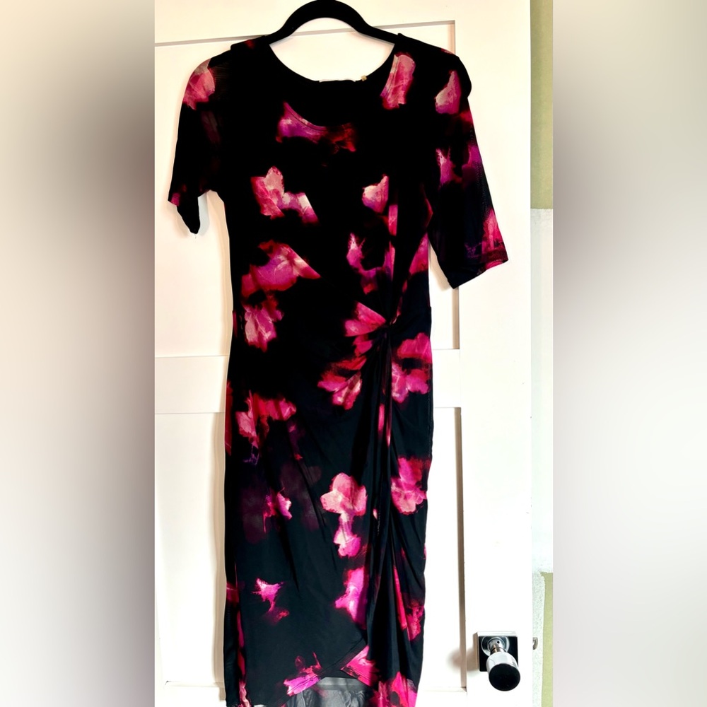 Beautiful stretchy fabric with gathering at waist very flattering